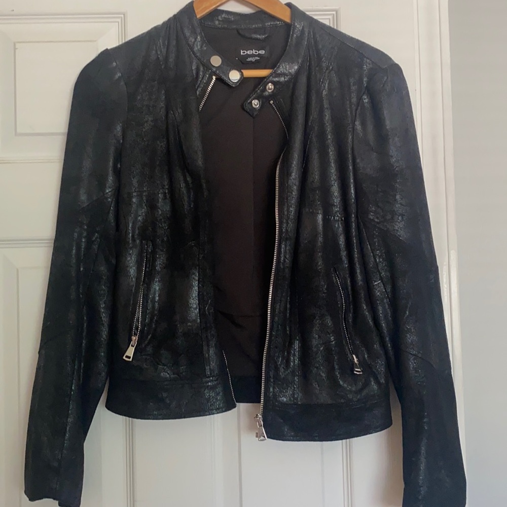 Black vegan leather with a  shiny texture size s